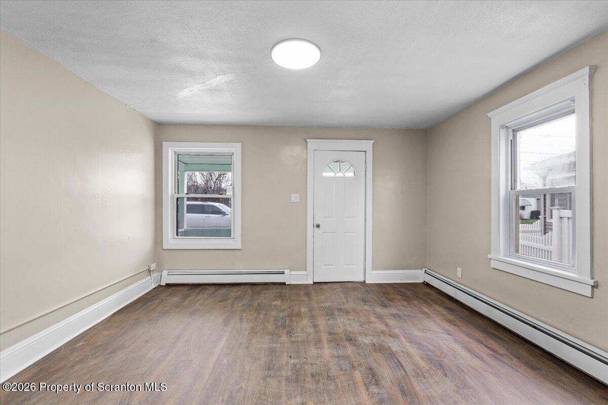 132 Penn Avenue Exeter, PA 18643 - Photo 6 of 44 an empty room with windows