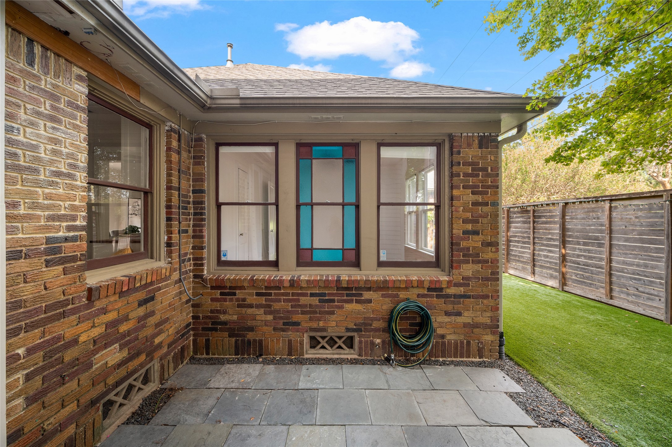 768 East 16th Street Houston, TX 77008 - Photo 6 of 49 Stained glass panel brings a pop of color and lots of charm.