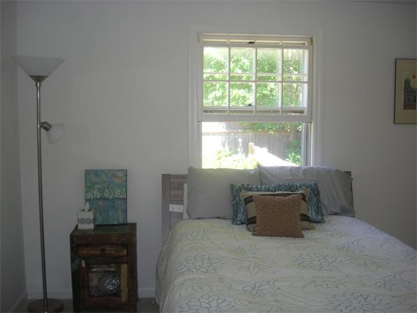 32 Baird Centerville, MA 02632 - Photo 9 of 14 a bedroom with a bed and a window