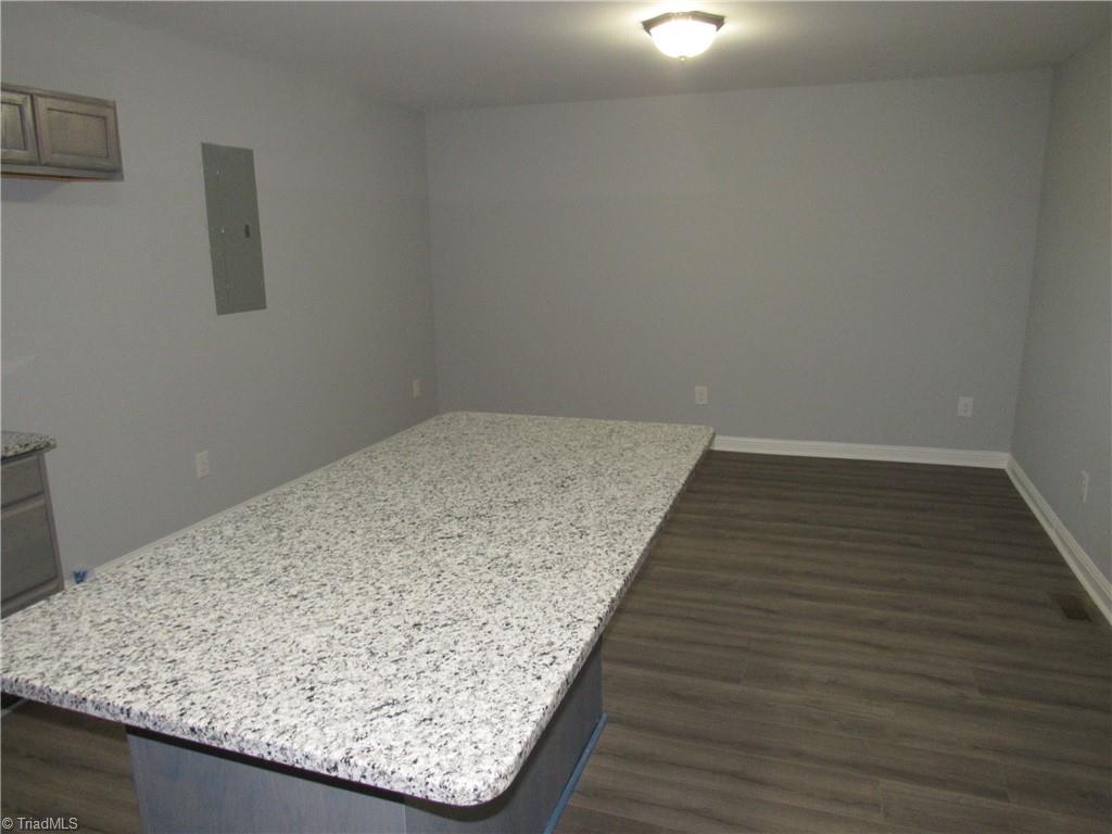 4060 Sowers Road Linwood, NC 27299 - Photo 11 of 28 Large granite island with breakfast bar