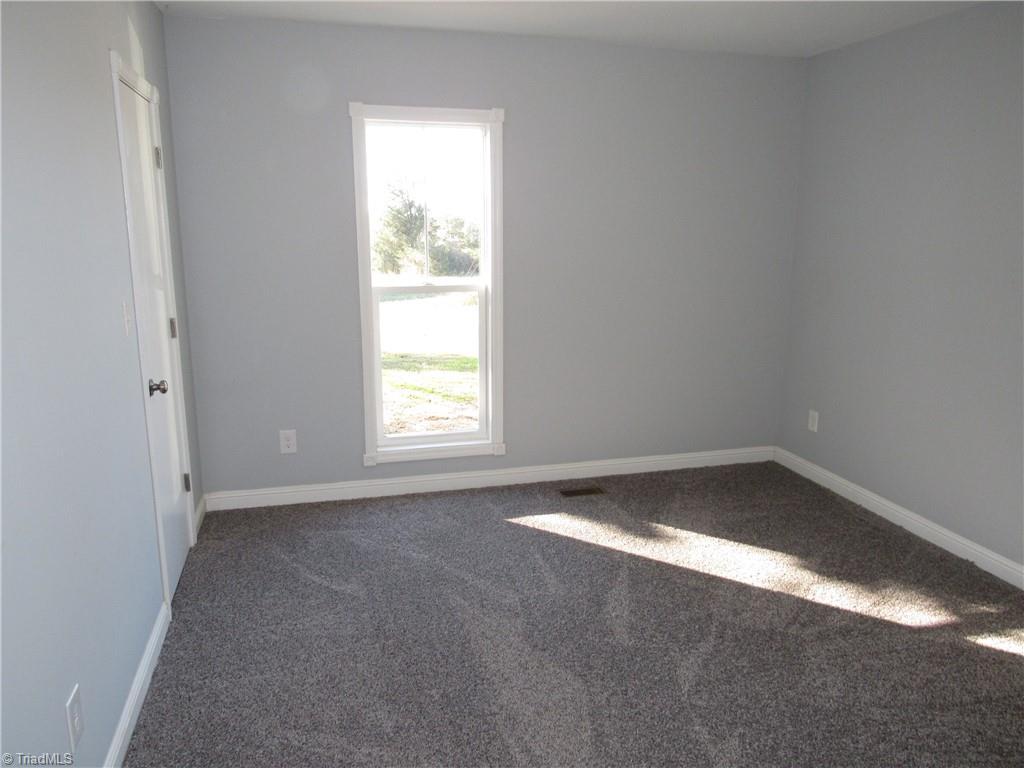 4060 Sowers Road Linwood, NC 27299 - Photo 15 of 28 Front bedroom