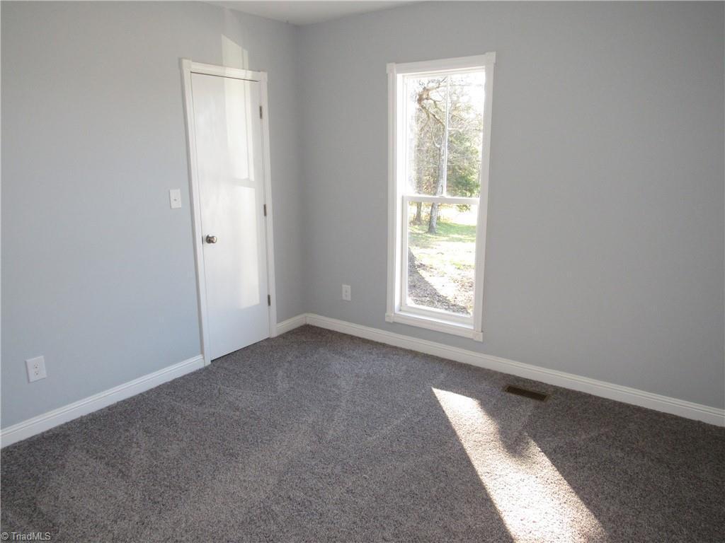 4060 Sowers Road Linwood, NC 27299 - Photo 16 of 28 Front bedroom with closet