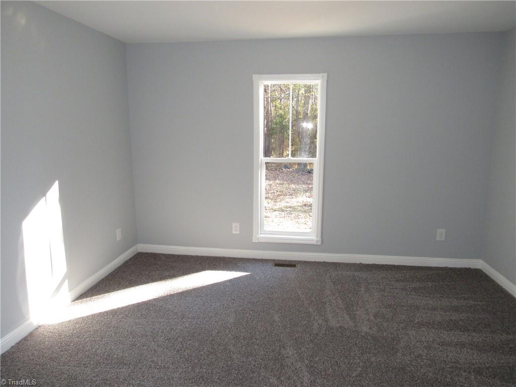 4060 Sowers Road Linwood, NC 27299 - Photo 17 of 28 Middle bedroom
