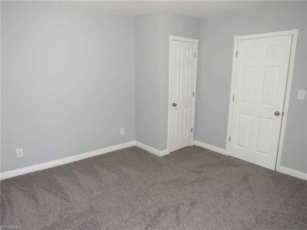 4060 Sowers Road Linwood, NC 27299 - Photo 18 of 28 Middle bedroom