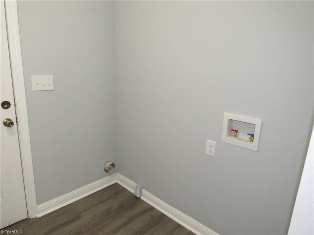 4060 Sowers Road Linwood, NC 27299 - Photo 22 of 28 Laundry area and door leads to the deck.