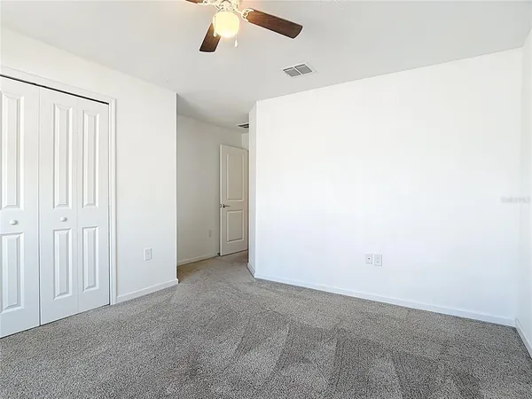 an empty room with closet