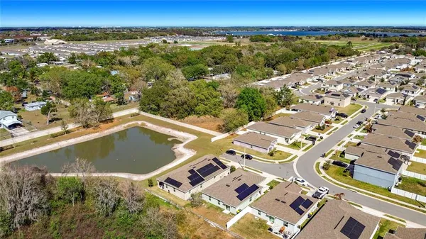 an aerial view of a house with a garden