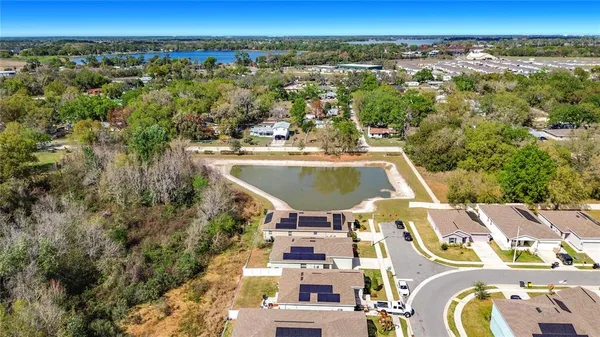 an aerial view of residential house with outdoor space
