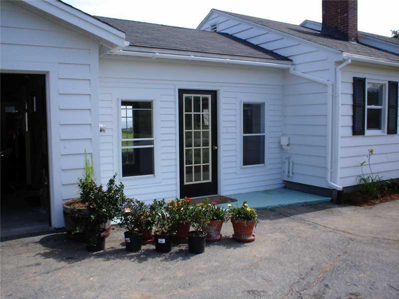1057 Cutler Road Whiting, ME 04691 - Photo 4 of 35 Exterior Front. Breezeway/Sunroom