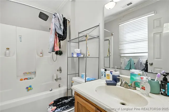 a bathroom with a sink a bathtub and a shower