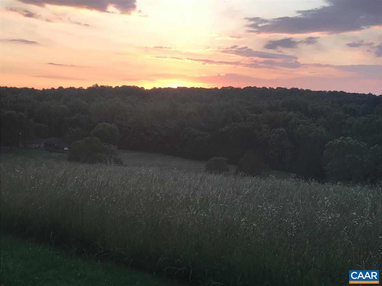 34 Guildford Farm Road Ruckersville, VA 22968 - Photo 1 of 21 a view of a yard next to a mountain