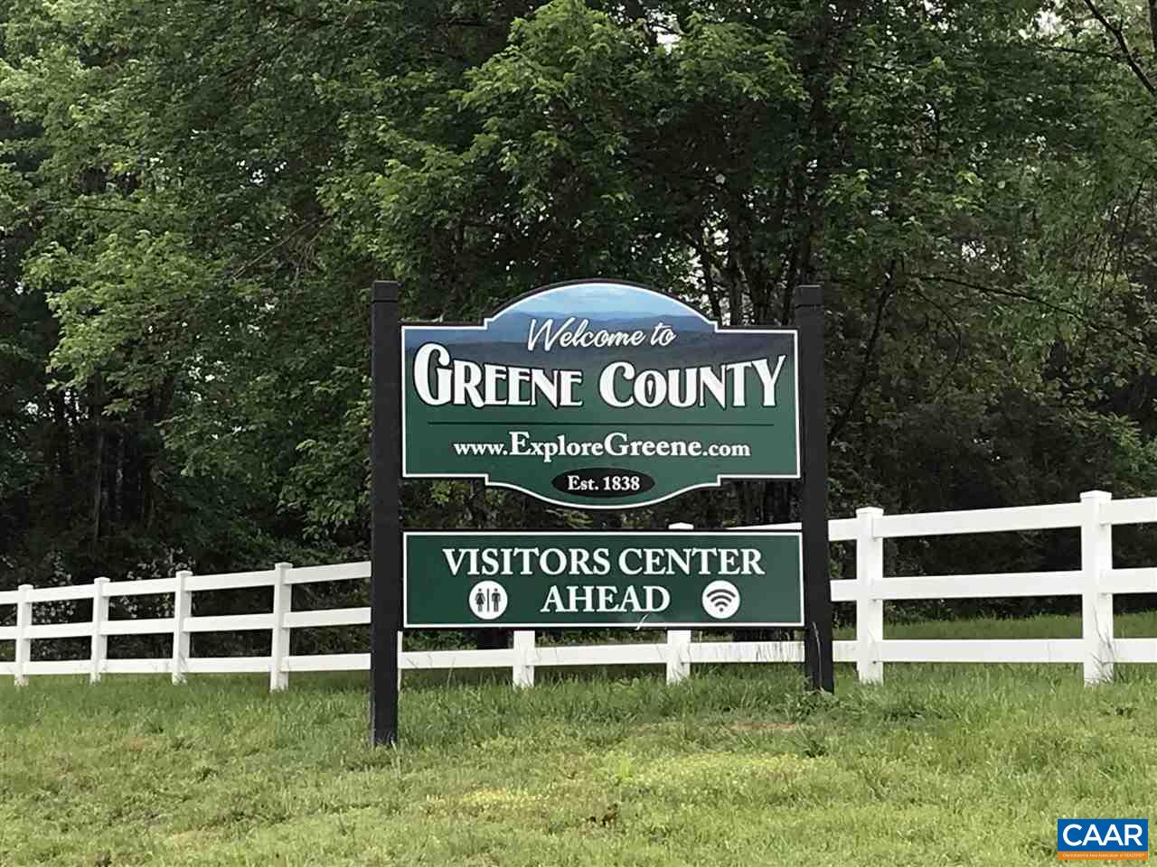 34 Guildford Farm Road Ruckersville, VA 22968 - Photo 9 of 21 a sign that is sitting on a big yard