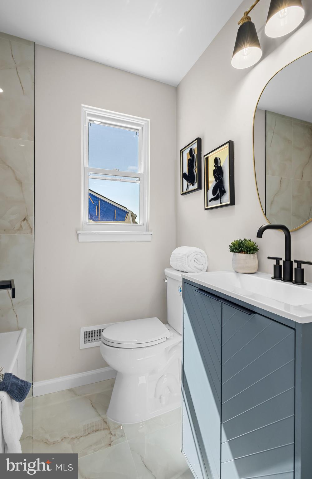 11 Charter Oak Road Clementon, NJ 08021 - Photo 26 of 35 a bathroom with a sink a toilet and mirror