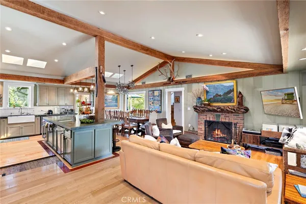 a kitchen with stainless steel appliances granite countertop a stove and cabinets