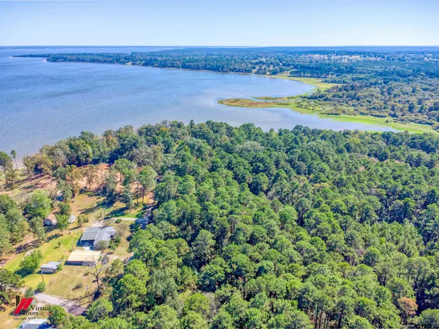a view of a swimming pool and an outdoor space