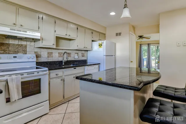 a bedroom with bed and window