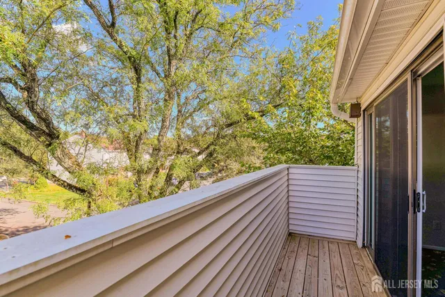 a view of a balcony with an outdoor space