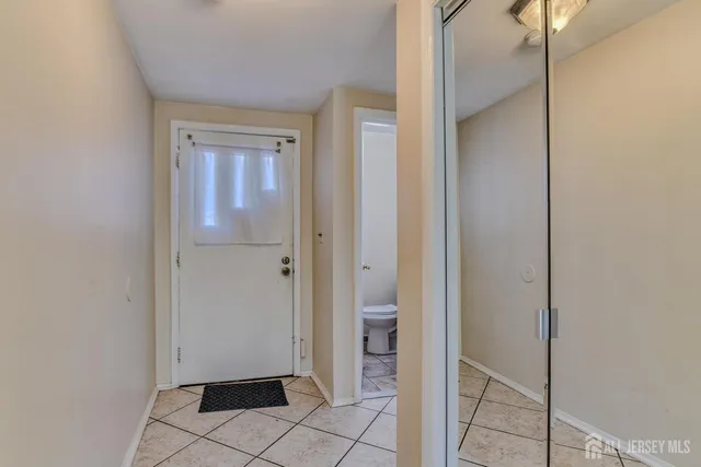 a view of an entryway with a door