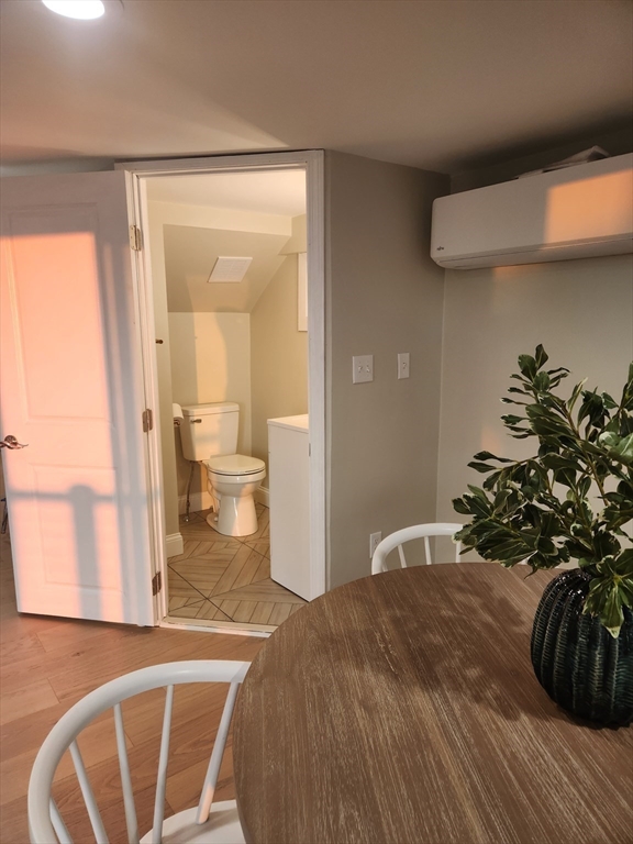 41 Pecksuot Road Weymouth, MA 02191 - Photo 19 of 22 a view of a room that has a bed and a chair in it