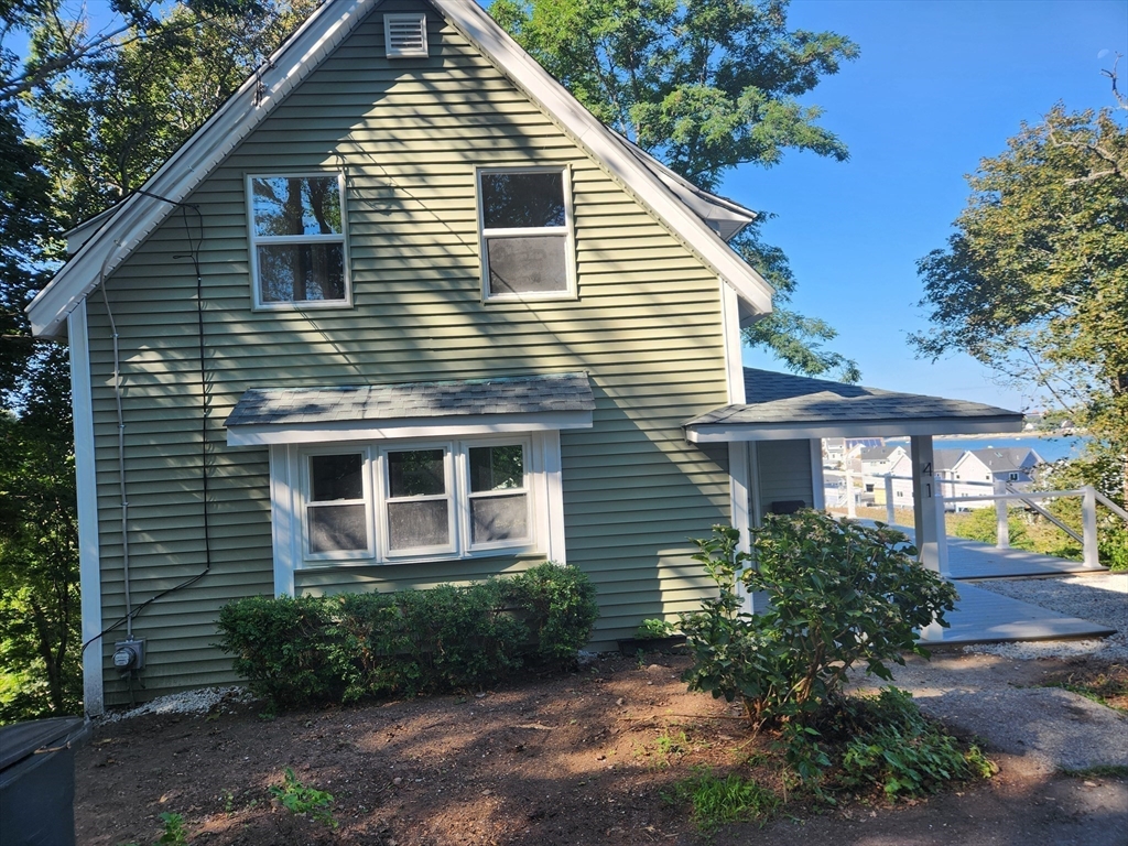 41 Pecksuot Road Weymouth, MA 02191 - Photo 21 of 22 a view of a house with a yard