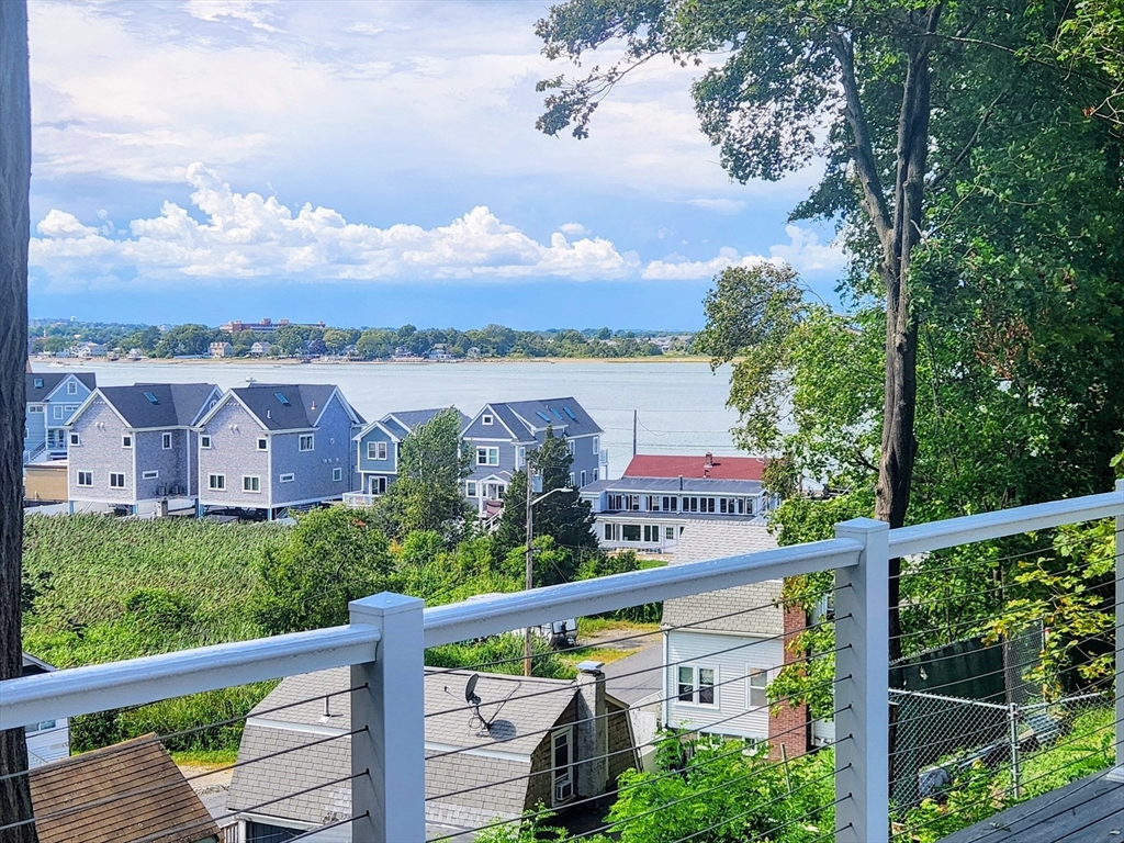 41 Pecksuot Road Weymouth, MA 02191 - Photo 3 of 22 a view of a city from a balcony