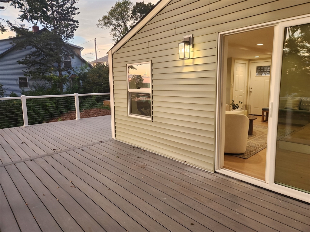 41 Pecksuot Road Weymouth, MA 02191 - Photo 5 of 22 a view of a house with wooden deck