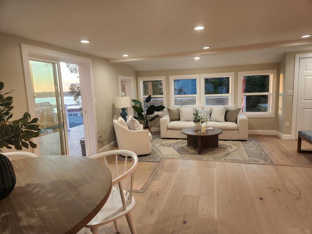 41 Pecksuot Road Weymouth, MA 02191 - Photo 6 of 22 a living room with furniture and large windows