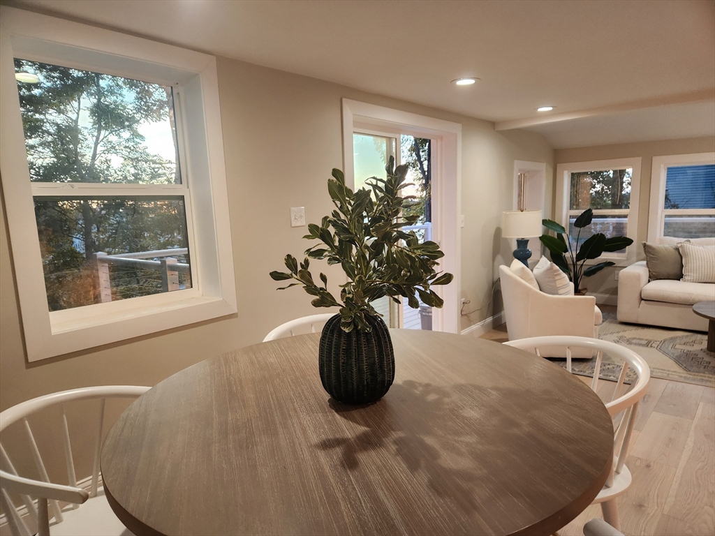 41 Pecksuot Road Weymouth, MA 02191 - Photo 7 of 22 a vase of flowers sitting on a table