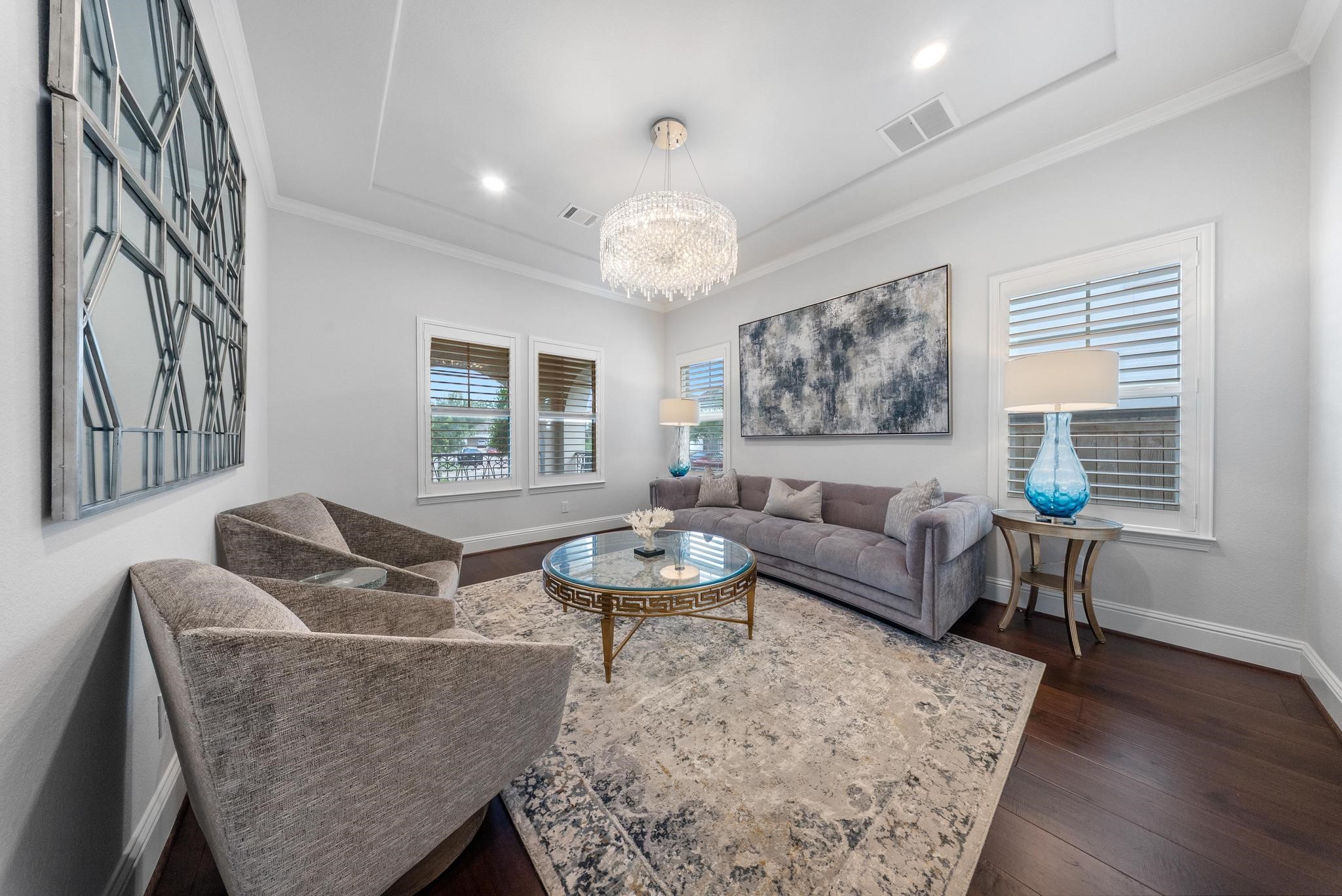 5403 Rouchel Brook Lane Sugar Land, TX 77479 - Photo 5 of 42 The home features a private office space which is being used as a formal living room. Room features custom plantation shutters.
