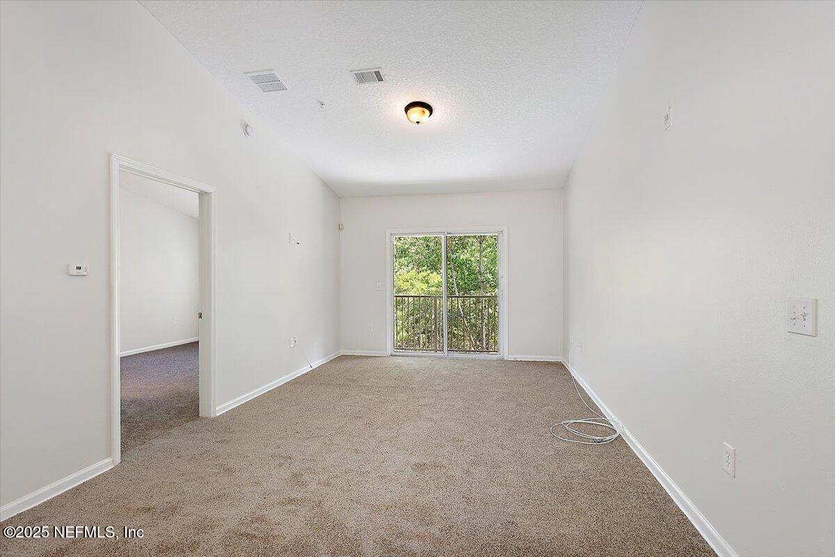 7920 Merrill Road, Unit 1014 Jacksonville, FL 32277 - Photo 2 of 12 02-Living Room