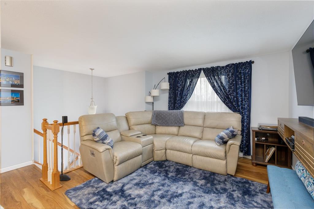 181 Partridge Run Road Gibsonia, PA 15044 - Photo 4 of 34 a living room with furniture and a wooden floor