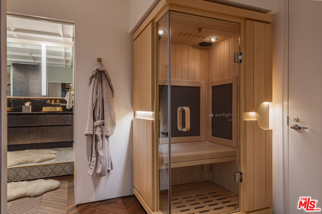 10727 Wilshire Boulevard, Unit 1805 Los Angeles, CA 90024 - Photo 23 of 34 a bathroom with a shower and a sink