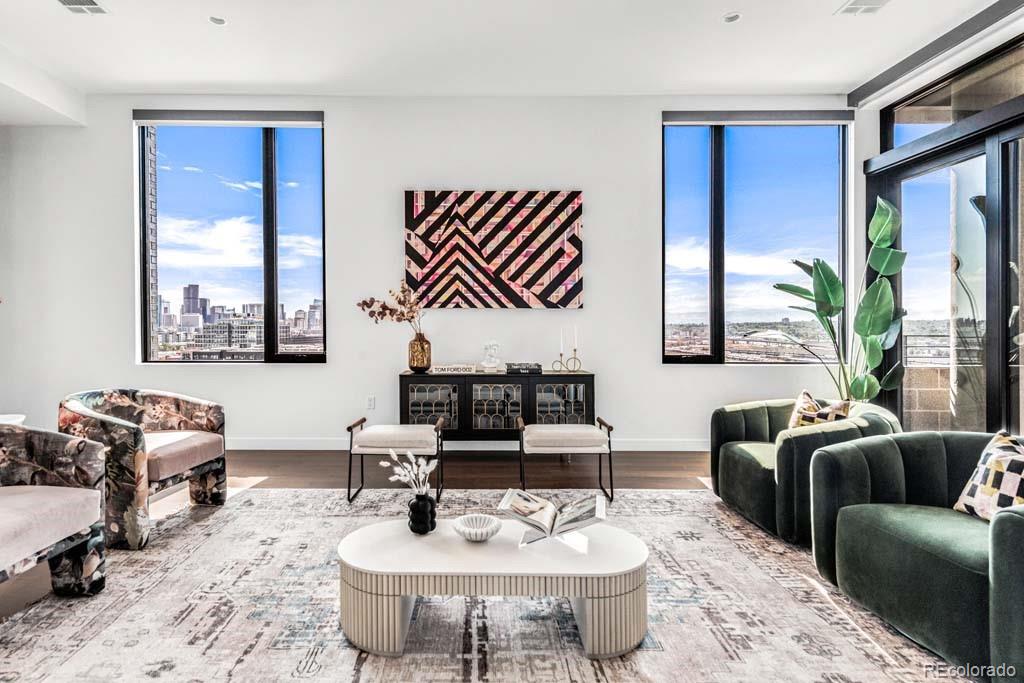 3520 Chestnut Place, Unit PH1201 Denver, CO 80216 - Photo 4 of 44 a living room with furniture potted plant and a window