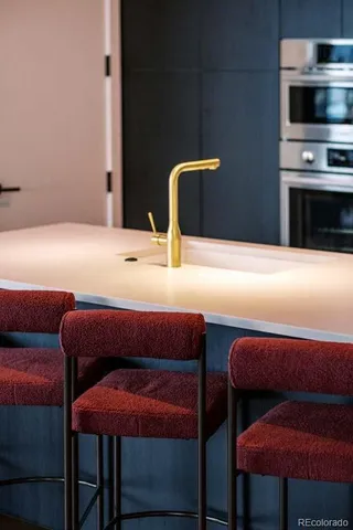 a bedroom with a bed and a television