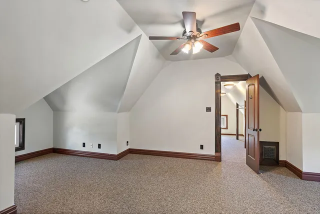 a view of a hallway with staircase