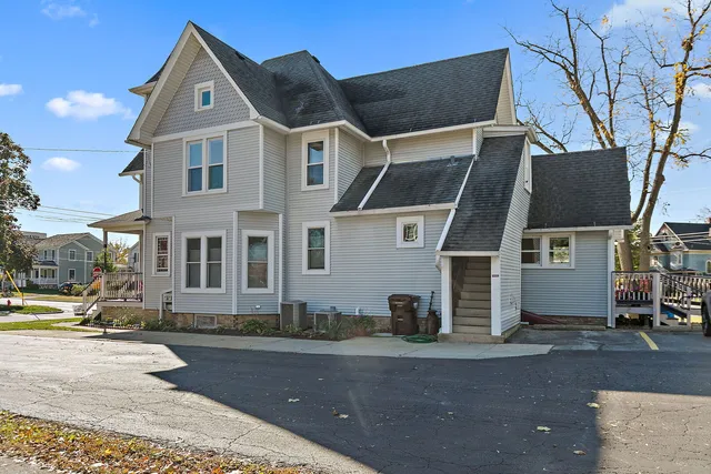 front view of a house with a street