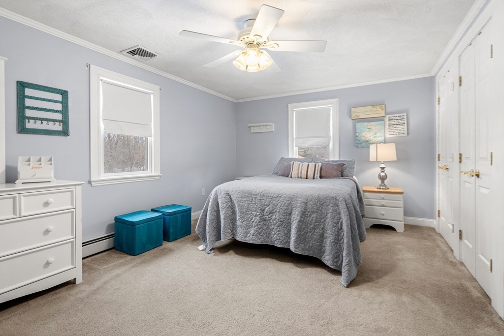 7 Belfast Road Peabody, MA 01960 - Photo 24 of 37 a bedroom with a bed dresser and a window