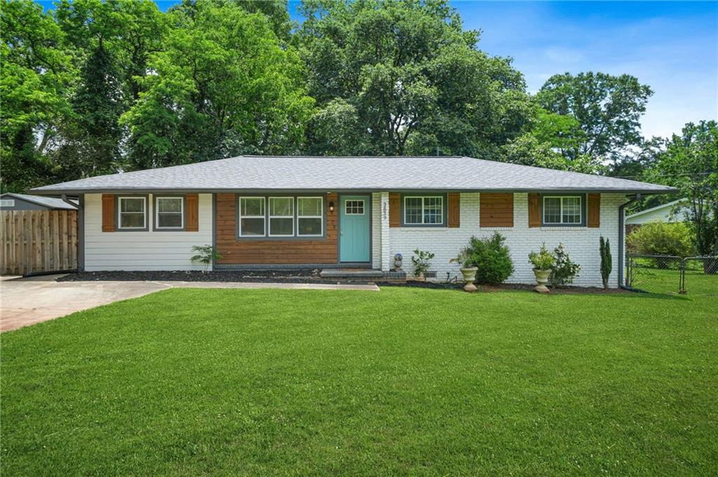 3839 Brookcrest Circle Decatur, GA 30032 - Photo 1 of 1 a front view of a house with a yard