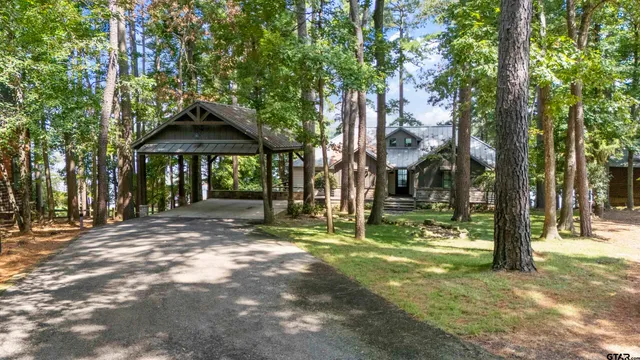 a view of a trees in front of a house