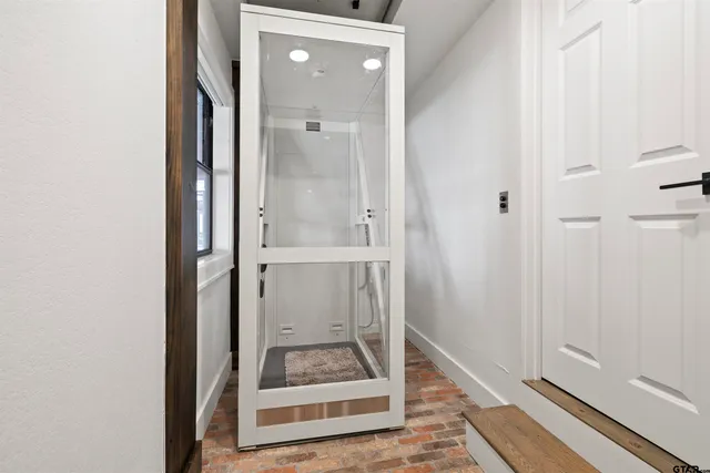 a view of a patio with couches table and chairs