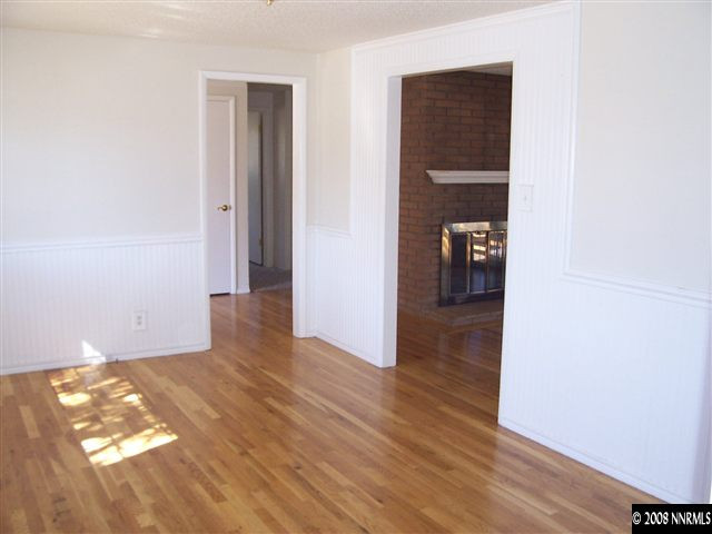 2265 West 7th Street Reno, NV 89503 - Photo 4 of 8 a view of hallway with wooden floor