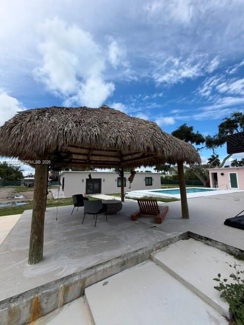 20465 Southwest 200th Street Miami, FL 33187 - Photo 6 of 36 a view of outdoor space with seating