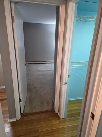 a view of a room with racks on the wall