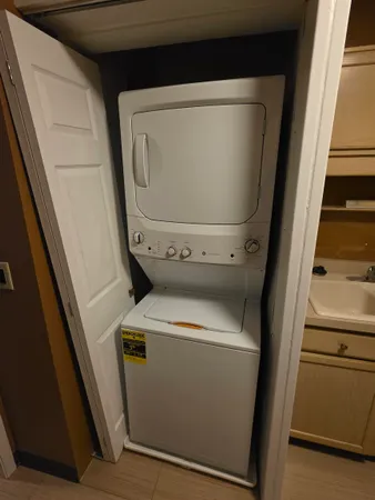 a utility room with dryer and washer