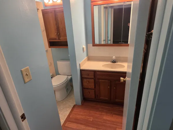 a bathroom with a bath tub with a shower