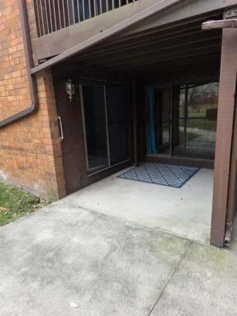a view of backyard with garage