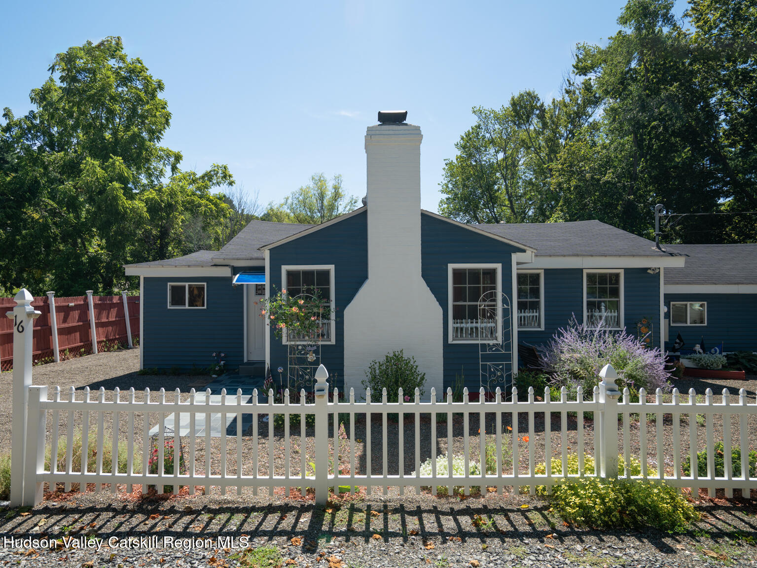16 Robin Road, Unit GO UP ROBIN ROAD NOT DOWN Copake, NY 12521 - Photo 32 of 32 a front view of house with a garden