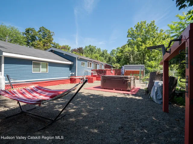 a view of a house with backyard