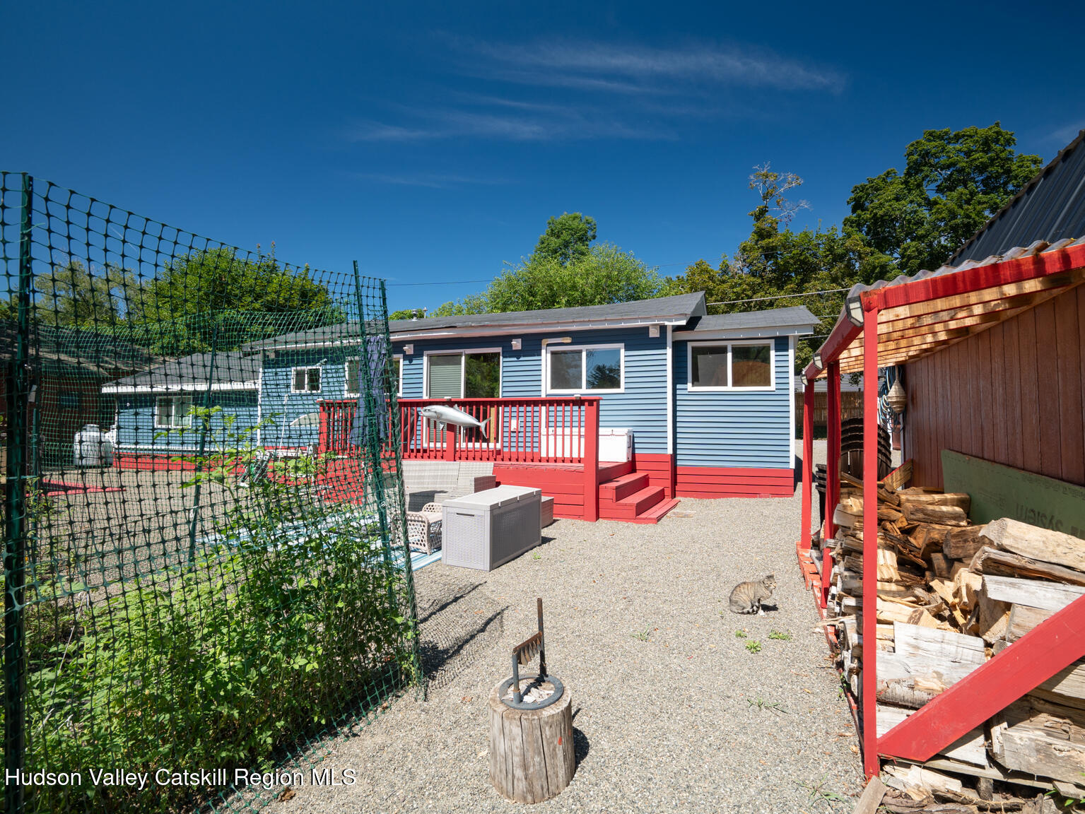 16 Robin Road, Unit GO UP ROBIN ROAD NOT DOWN Copake, NY 12521 - Photo 9 of 32 an outdoor view of the house with outdoor seating