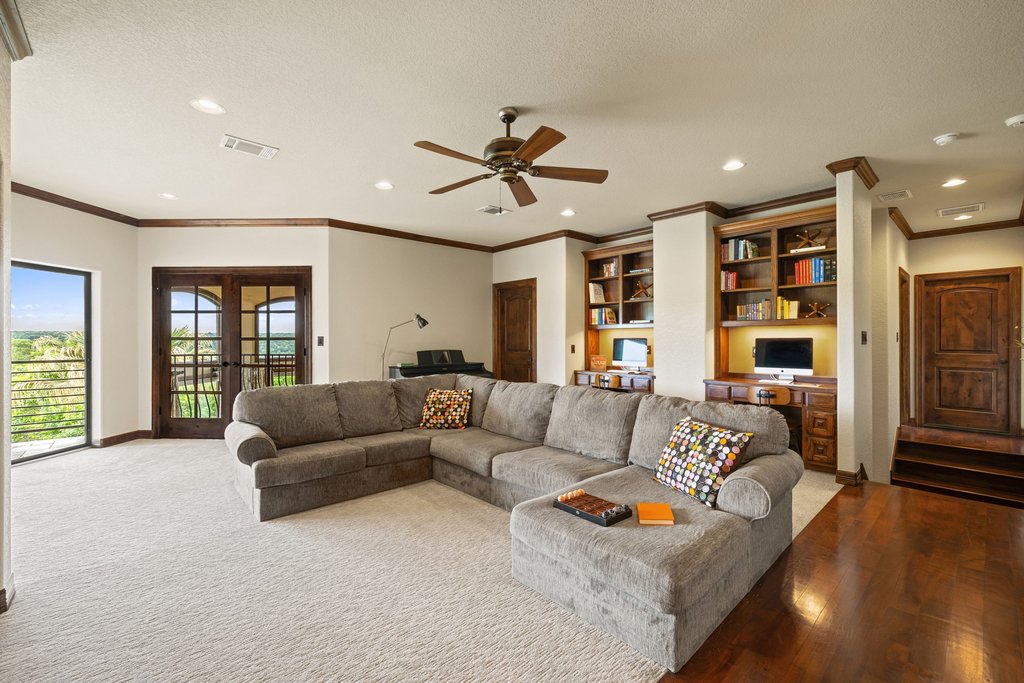 1540 County Road 262 Georgetown, TX 78633 - Photo 17 of 40 Upstairs, the generous media and entertainment space is designed for gathering.